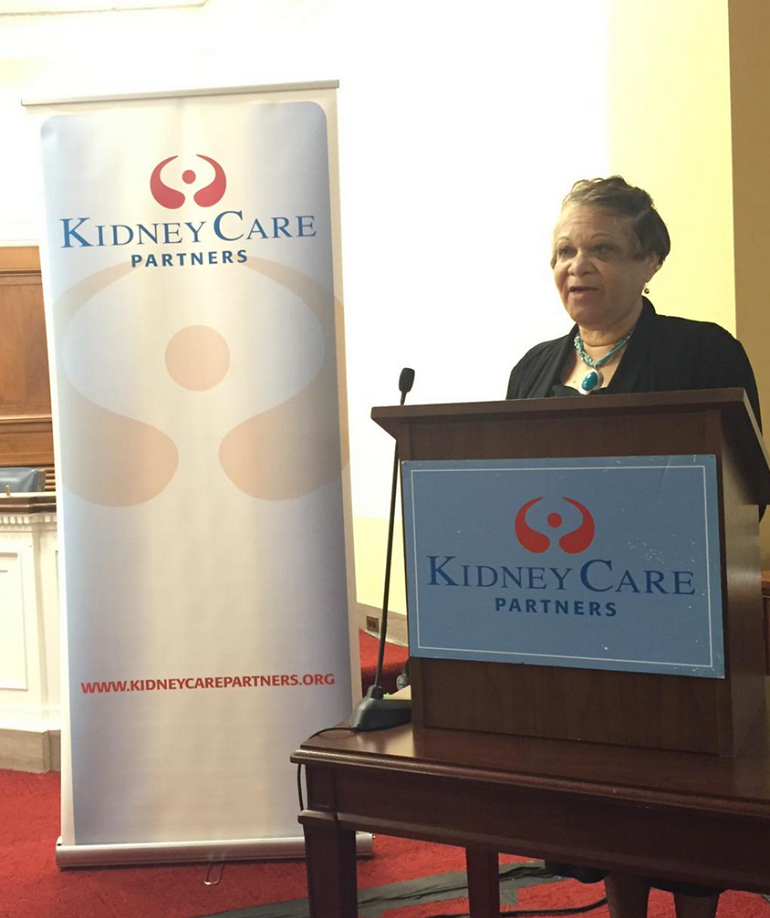 Nancy Scott takes the podium to provide the patient perspective on advancing kidney care.