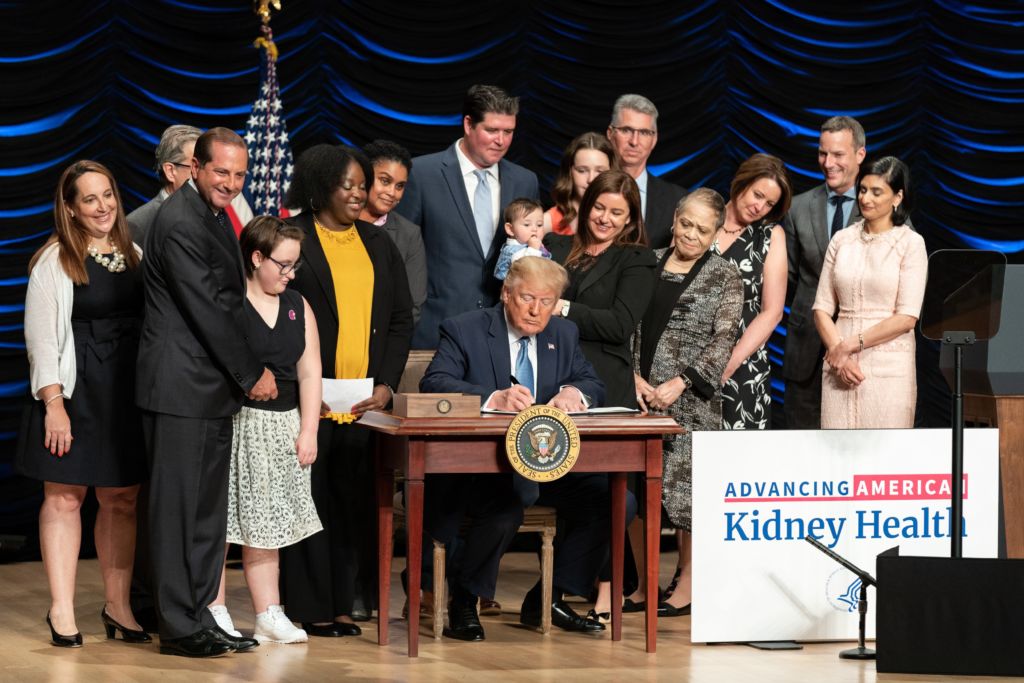 President Donald J. Trump signs an Executive Order on Advancing American Kidney Health Wednesday, July 10, 2019, at the Ronald Reagan Building and International Trade Center in Washington, D.C. (Official White House Photo by Shealah Craighead)
